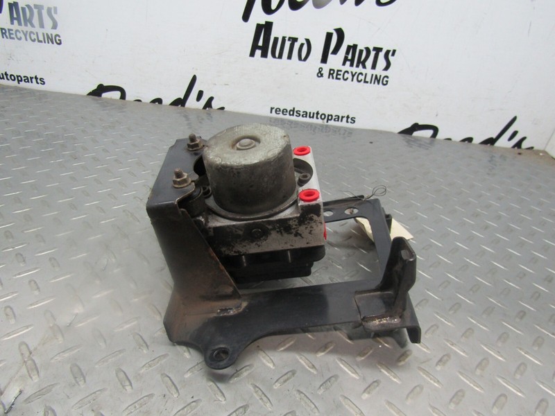 99 00 MAZDA MILLENIA ANTI LOCK BRAKE PART ASSEMBLY WITH TRACTION CONTROL 2500